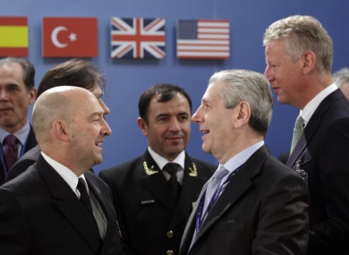 Italian Defence Minister Giampaolo Di Paola, third right, speaks with Supreme Allied Commander Europe, US Navy Admiral James Stavridis, at the summit in Belgium.