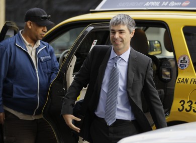 Google CEO Larry Page walks into a federal building in San Francisco earlier today to continue giving evidence in a case against his company.