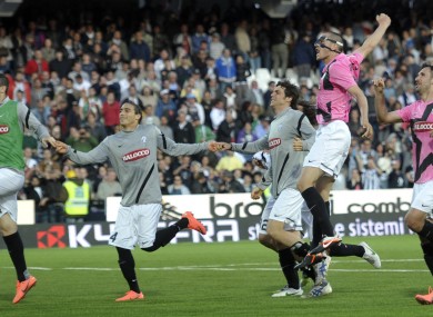 Juve players celebrate their win over Cesena.