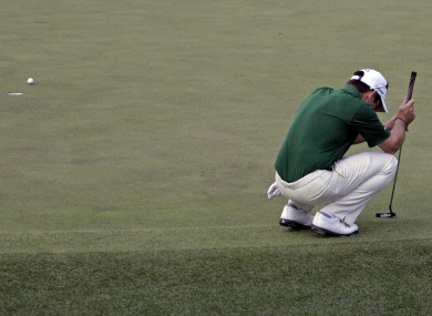 Louis Oosthuizen reacts after missing a putt on the 10th hole.
