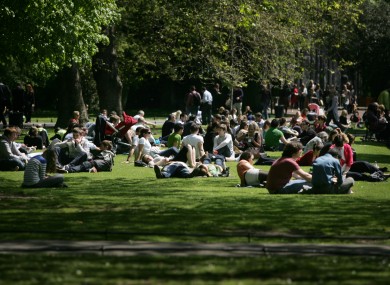 People enjoying the sun in St Stephen's Green yesterday.