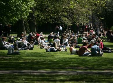 People enjoying the sunny weather in Dublin on Monday, when temperatures hit 19°C. They could reach 24°C later this week.