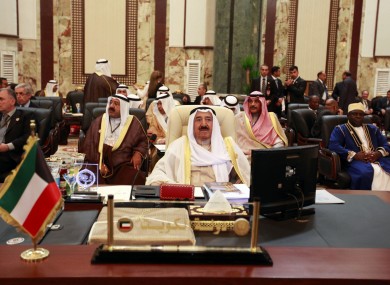 Kuwait's emir, Sheik Sabah Al Ahmad Al Sabah, center, attends the Arab League summit in Baghdad, Iraq, Thursday, March, 29, 2012
