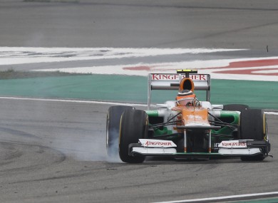 Force India Formula One driver Nico Hulkenberg of Germany locks up his brakes during the Chinese Formula One Grand Prix.