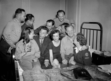 May 1945: AP Paris staff gather to bid farewell to Ed Kennedy, seated centre left, after AP's general manager called him back to the US.