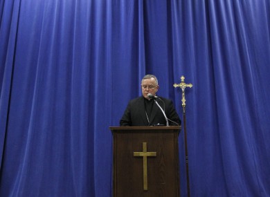 Archbishop of Philadelphia Charles Chaput reads his statement yesterday