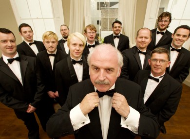 Lookin' sharp: Marty Whelan dressed in his own tuxedo along with volunteers from the Wexford Opera Festival at the National Gallery of Ireland launching the opera festival.
