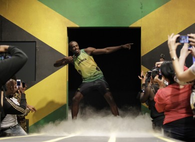 Usain Bolt models a Jamaica Olympic kit designed by Cedella Marley, daughter of Bob Marley, during the kit unveiling in London on Friday.