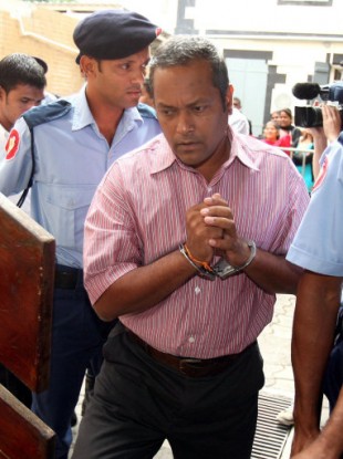 Murder accused Sandip Moonea at the Supreme Court in Port Louis.