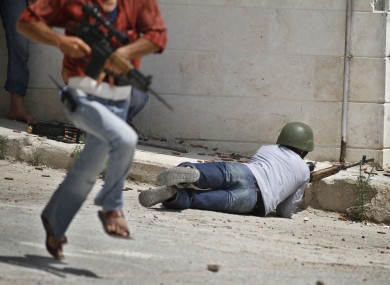 Free Syrian Army fighters during a gunfight in Idlib, northern Syria