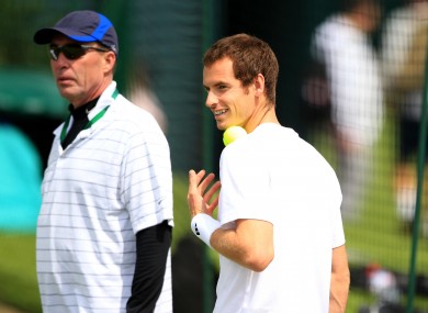 Andy Murray is watched by coach Ivan Lendl.