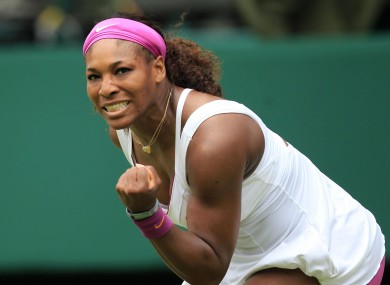 USA's Serena Williams celebrates winning a point against Hungary's Melinda Czink.