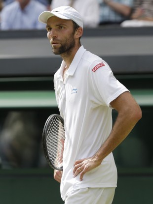 Ivo Karlovic reacts during a second round men's singles match against Andy Murray.