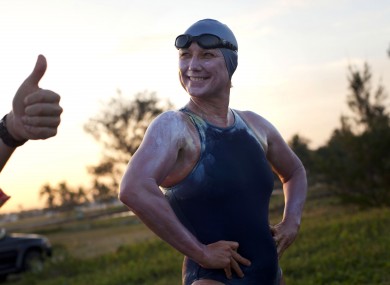 British-Australian swimmer Penny Palfrey smiles as she is flashed a thumbs up at the start of her bid to complete a record swim.
