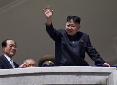 Kim Jong-un waves to supporters after a mass rally in April. Kim has given himself the title of 'Marshal' - an office previously held by his father and grandfather.