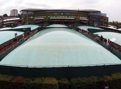 General view of Covers on the outside courts as rain falls on Day Seven of the 2012 Wimbledon Championships.