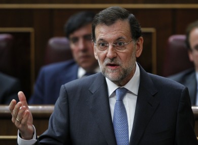 Ministers have approved a €100bn bailout for Spain's banks, while its premier Mariano continues an austerity agenda to close the government's deficit.