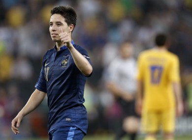 France's Samir Nasri salutes fans as he leaves the pitch after the game with Ukraine.