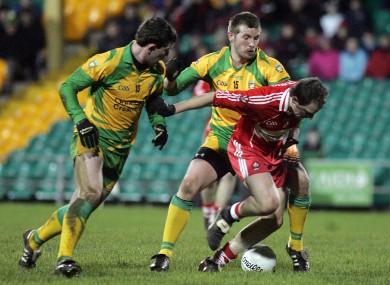 Conor McManus (middle) pictured with Donegal's Patrick McBrearty and Derry's Brian McCallion in a Dr McKenna Cup game earlier this year.
