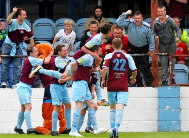 The Drogheda players celebrate.