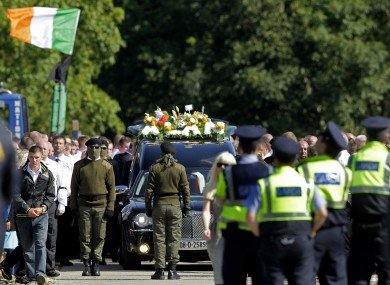 Mourners at the funeral of Alan Ryan in north Dublin yesterday.