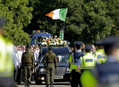 Mourners and Gardaí at last weekend's funeral for Alan Ryan.