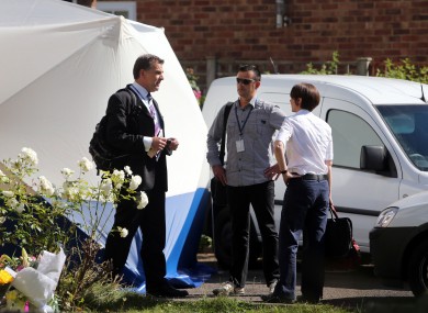 British and French police officers (identities not known) talk outside the home of French shooting victim, Saad al-Hilli in Claygate, Surrey.