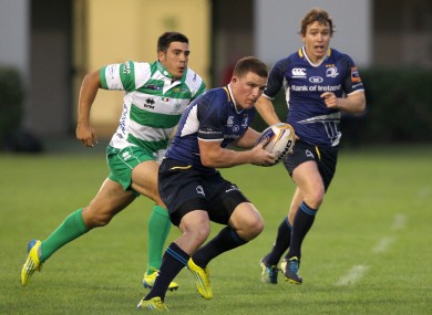 Leinster's Andrew Conway escapes from Edoardo Gori of Treviso.