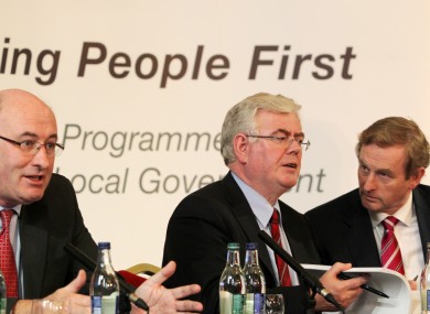 Environment Minister Phil Hogan, Tánaiste Eamon Gilmore and Taoiseach Enda Kenny at the announcement of local government reforms yesterday.