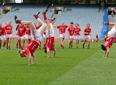 Cork's Breige Corkery, Roisin O'Sullivan and Grace Kearney celebrate with acrobatics after beating Kerry.