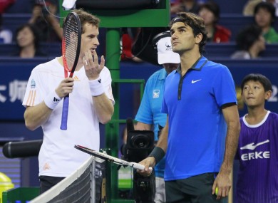 Andy Murray and Roger Federer discuss rain drops.