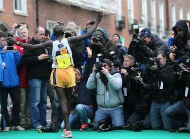 Ndungu poses for the press after winning today's race.