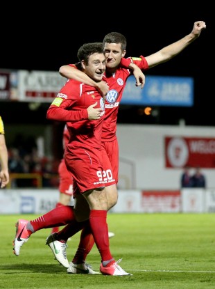 Top men: Sligo's Mark Quigley and Jason McGuinness celebrate.