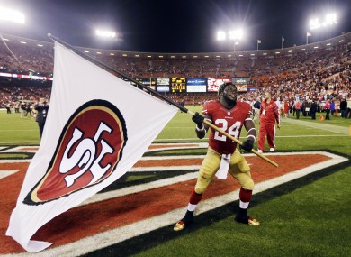 San Francisco 49ers running back Anthony Dixon celebrates after their 13-6 win over the Seattle Seahawks.