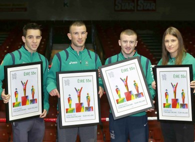 Olympic boxers Michael Conlon, John Joe Nevin, Paddy Barnes and Katie Taylor with their commemorative postage stamps.