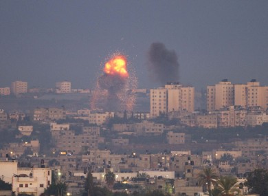 Explosion and smoke rise following an Israeli air strike in the northern Gaza Strip