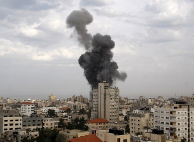 Explosion and smoke rise following an Israeli strike in Gaza City