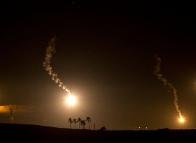 Smoke and flares of Israeli illumination rounds over the northern Gaza Strip as seen from the Israel Gaza Border in southern Israel