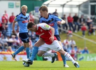 UCD's Paul Corry and John Russell of St. Pats.