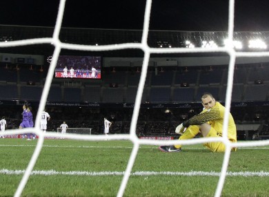 New Zealand's Auckland City FC's goalkeeper Tamati Williams, right, reacts after Japan's Sanfrecce Hiroshima's scored a goal during their match at the Club World Cup soccer tournament.