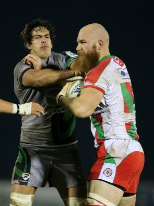 Mike McCarthy gets to grips with Erik Lund.