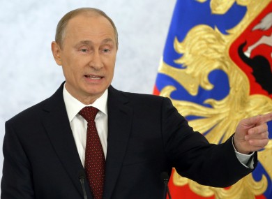 Russian President Vlamimir Putin speaking during a state-of-the nation address in Moscow today.