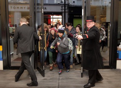 Run! Shoppers rush to pick up some bargains at the Stephen's Day sales in Dublin on Wednesday