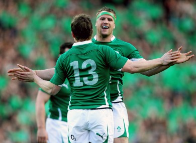 Jamie Heaslip and Brian O'Driscoll celebrate a try against Scotland.