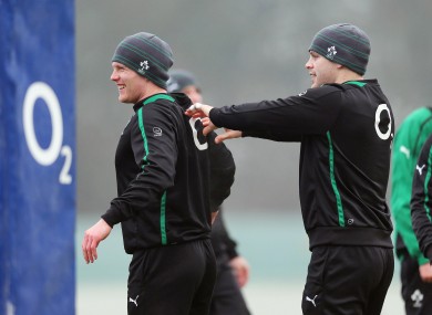 Darren Cave gives Keith Earls a friendly shove.