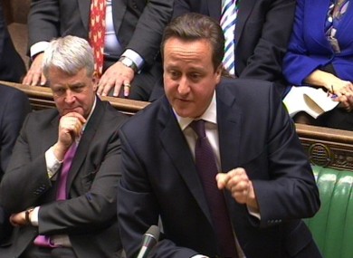 Prime Minister David Cameron speaks during Prime Minister's Questions in the House of Commons today.