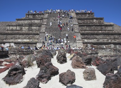 A file photo of tourists on a pyramid at Teotihuacan, an old city-state in Mexico near where the skulls were found.