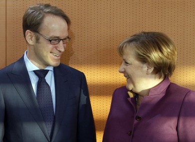 Bundesbank governor Jens Weidmann, pictured with chancellor Angela Merkel last year.