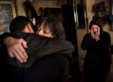 A Madrid family reacts when they hear their eviction has been suspended earlier this month