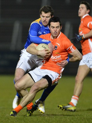 Armagh's Aaron Kernan and Longford's Aidan Rowan in action on Saturday evening.